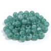 A pile of 50 imitation jade acrylic cloud beads in a light green color for jewelry making.