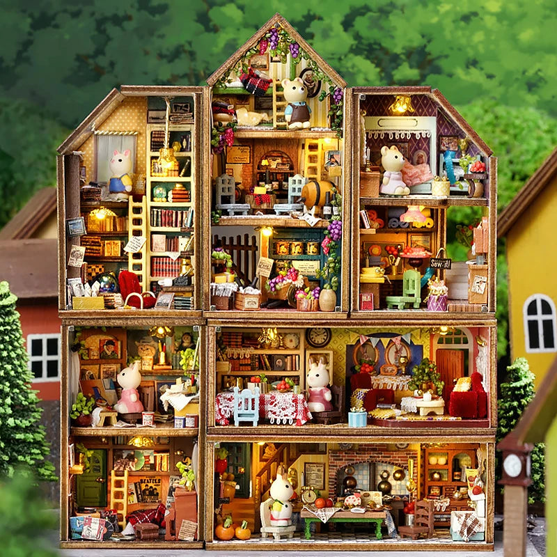 A detailed wooden miniature dollhouse kit featuring various figures and furniture arranged in an attic-style structure.