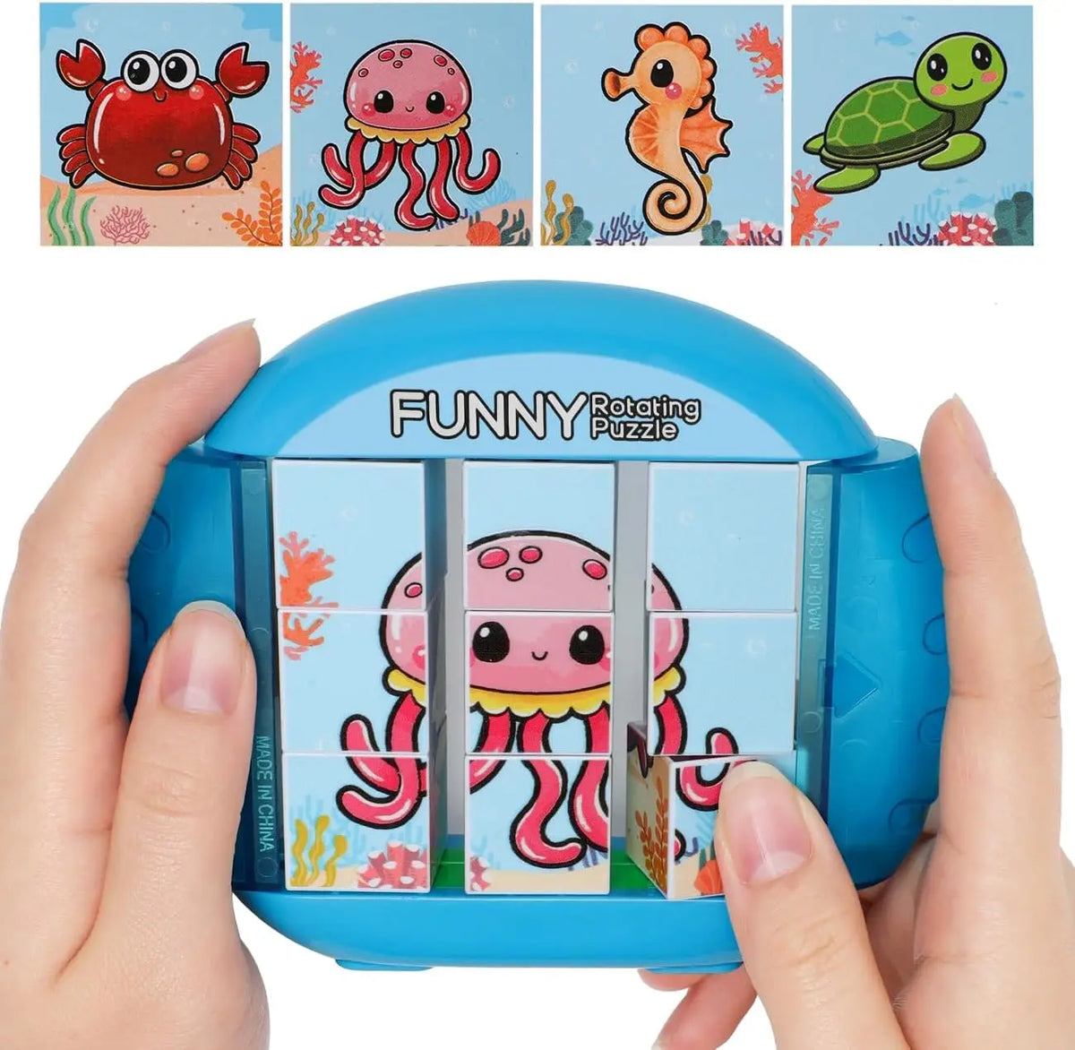 A hand holds a blue rotating puzzle toy featuring four colorful sea creatures.