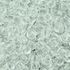 A close-up view of clear, solid color pony beads for jewelry making and craft projects.