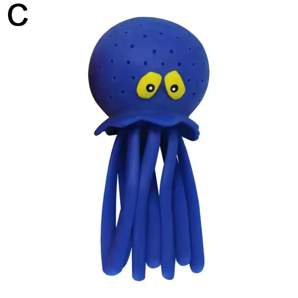A bright blue squeeze and soak octopus bath toy for toddlers.