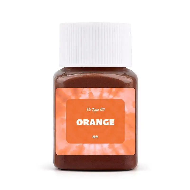 A small glass jar of orange textile fabric dye kit with a white cap.