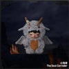 A plush doll pendant of The Soul Corroder featuring a gray, furry creature with horns and a fierce expression.