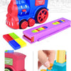 A red and blue Domino train toy set with accessories showing auto place dominoes and adjustable driving direction.