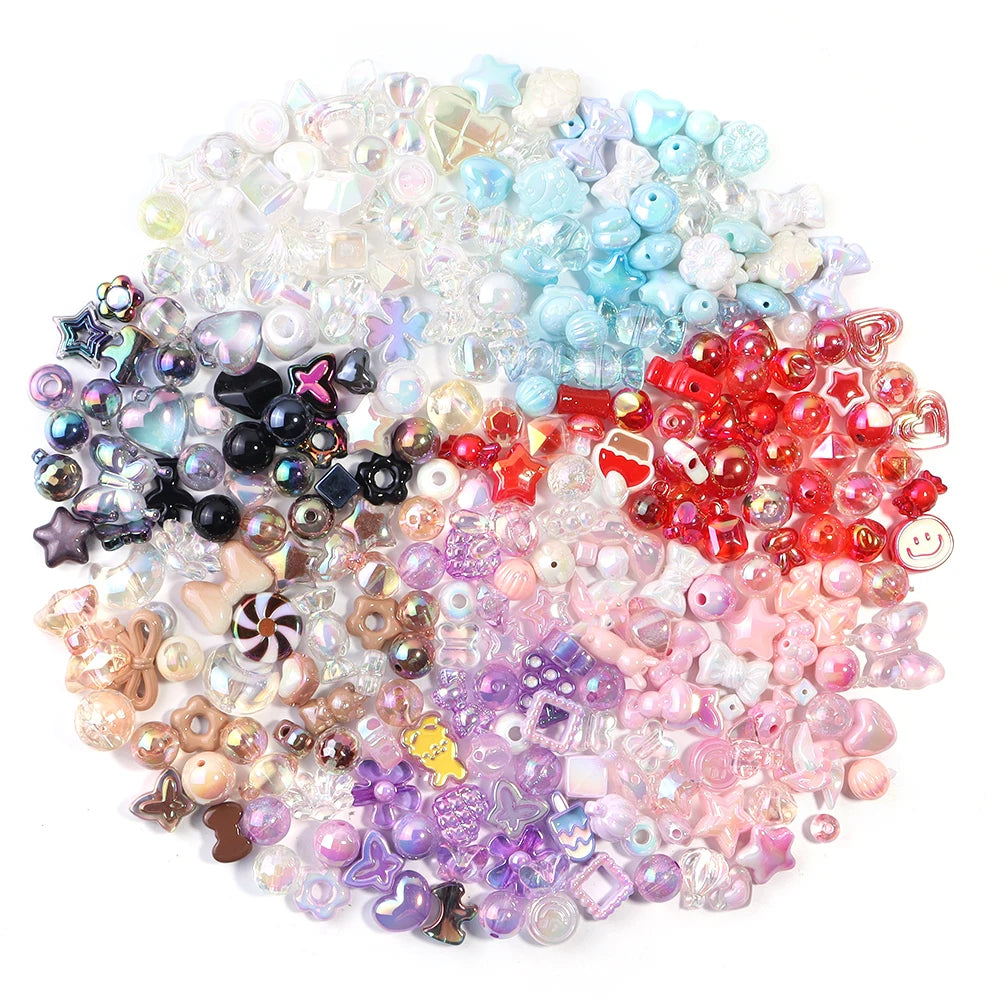 A pile of colorful acrylic bow beads in various shades including blue, pink, purple, and red.