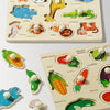 A wooden shape matching puzzle board featuring various fruit and vegetable shapes for early learning.