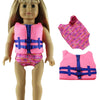 A doll wearing a pink and purple outfit set including a vest and a top with a floral detail.