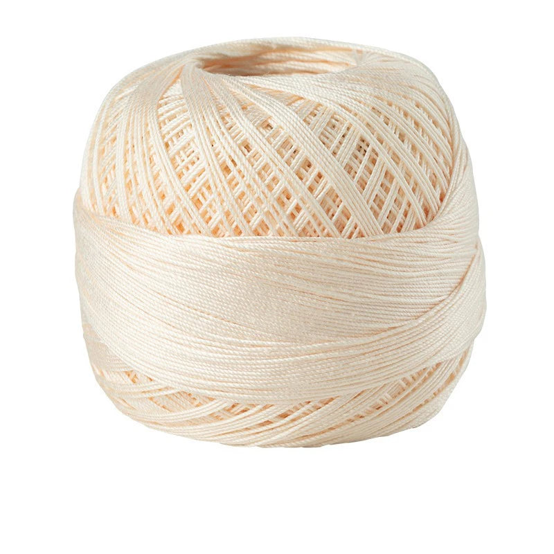 A ball of light beige 100% cotton crochet thread for tatting and embroidery.