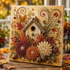 A framed piece of wall art featuring a detailed painting of an autumn harvest scene with textured leaves and pearls.