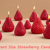 Three different sized strawberry silicone molds used for making candles, soap, fondant, and epoxy resin.