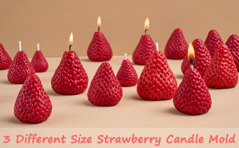 Three different sized strawberry silicone molds used for making candles, soap, fondant, and epoxy resin.