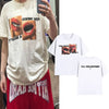 A white t-shirt featuring a graphic of a face with open lips and text on the front.