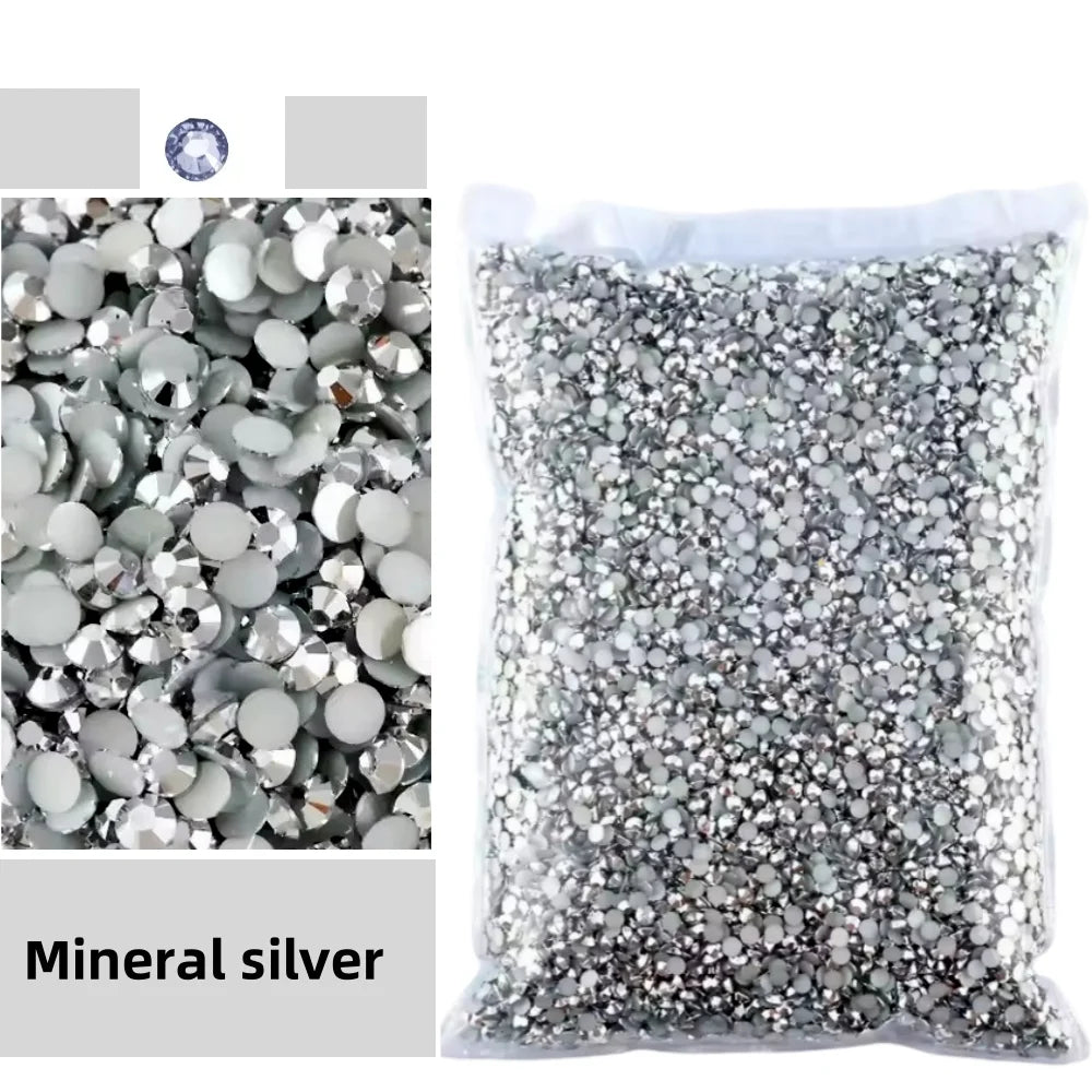 Bag of silver mineral glitter and flat back resin rhinestones for crafts and DIY projects