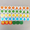 A collection of 20 circular face cards in various expressions and colors for a strategy board game.