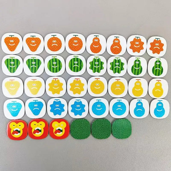 A collection of 20 circular face cards in various expressions and colors for a strategy board game.