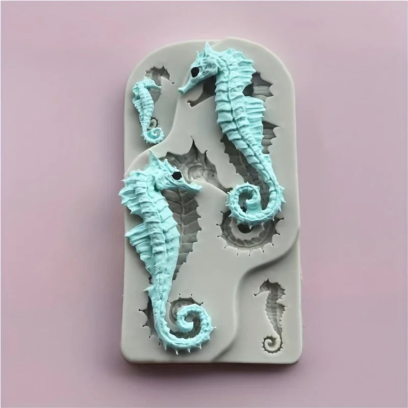 A silicone mold featuring detailed seahorse shapes for resin and clay crafts.