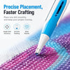 A close-up of a blue and white diamond painting pen is smoothly placing beads onto a fabric surface.