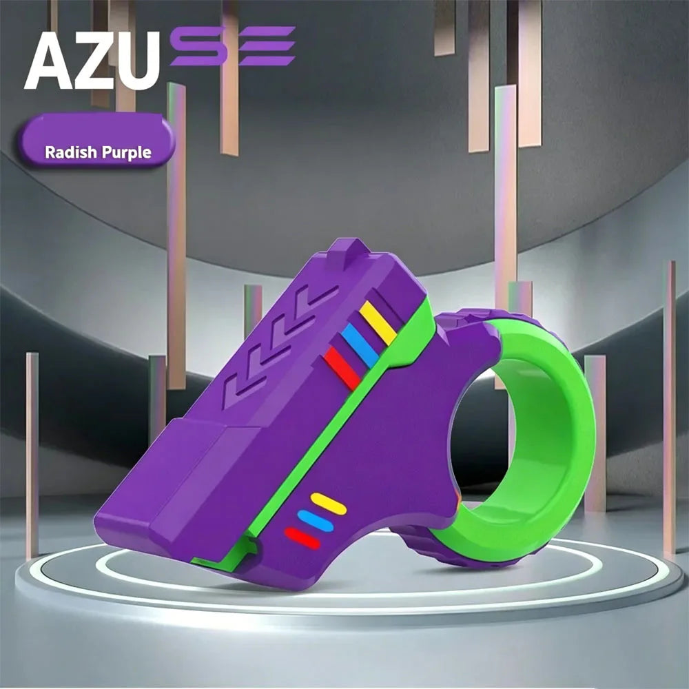 A purple magnetic fidget push card with a green spinner is displayed on a gray surface.