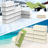 White and green sand bricks stacked in various configurations on a beach background