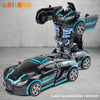 A black and blue transformable robot sports car toy with a robot figure, shown in a studio setting.