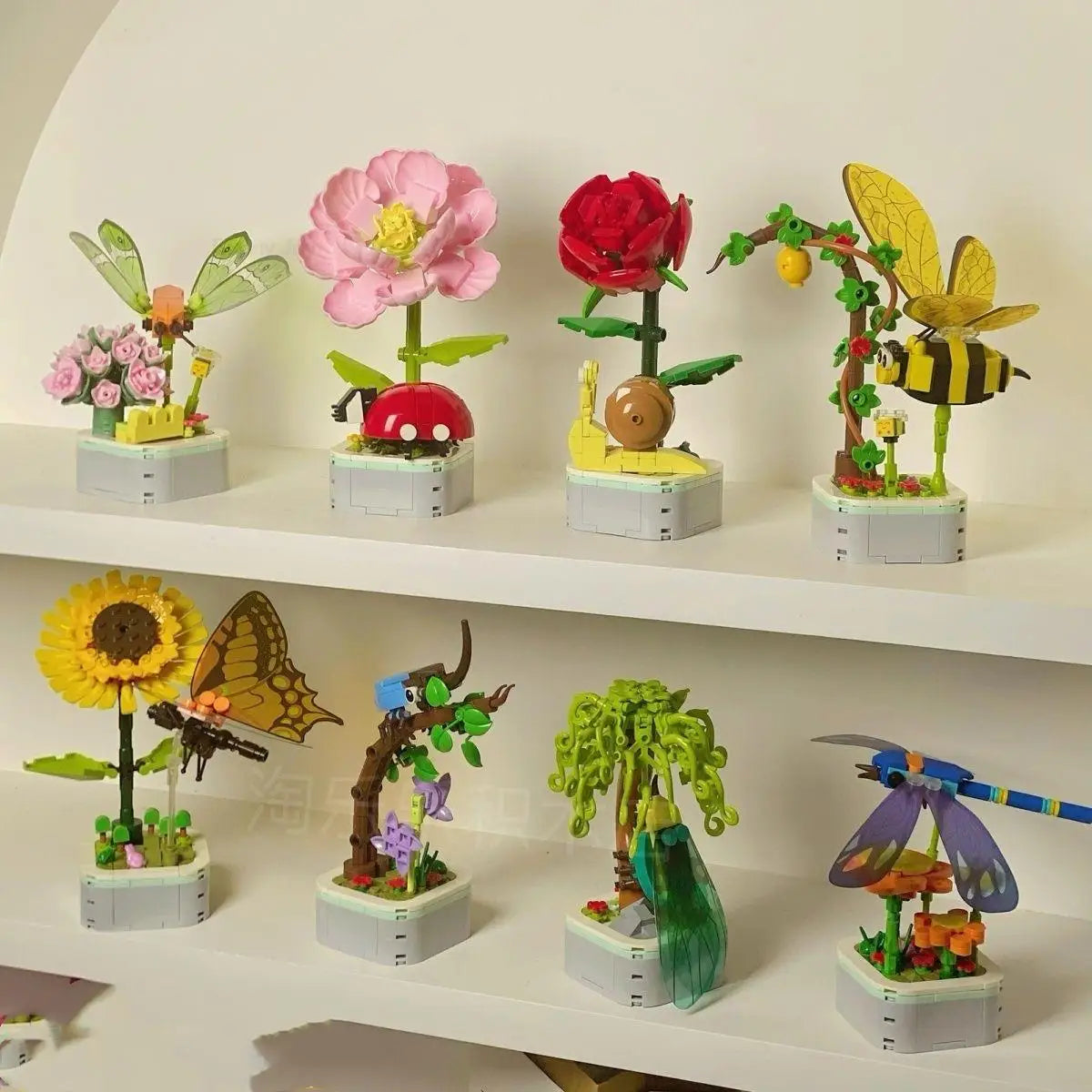 A collection of floral building blocks featuring roses, sunflowers, and other flowers in various colors and arrangements.