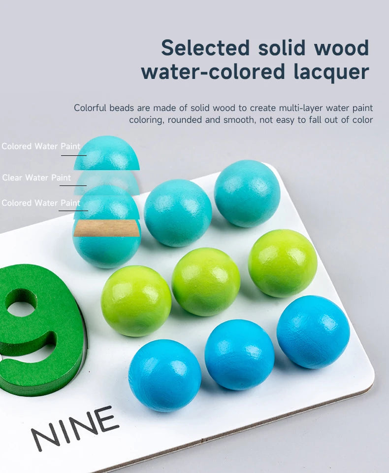 A collection of nine solid wood water-colored lacquer beads in various shades of blue and green on a white surface.