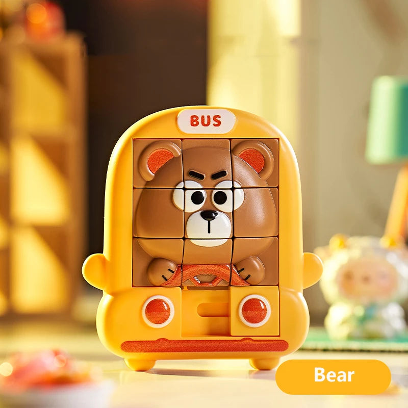 A yellow bear-shaped slide puzzle for kids featuring a brown bear design.