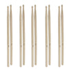 A set of three maple wood drumsticks labeled 5A, 5B, and 7A standing vertically.