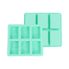 A light mint green silicone soap mold with six cavities featuring intricate lace patterns for handmade soaps and crafts.