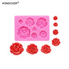 A pink silicone mold featuring various rose and peony flower shapes for resin, jewelry, and baking.