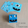 A set of six light blue face cards or puzzle pieces with cartoon eyes and mouths, next to a small stack of blue wooden blocks