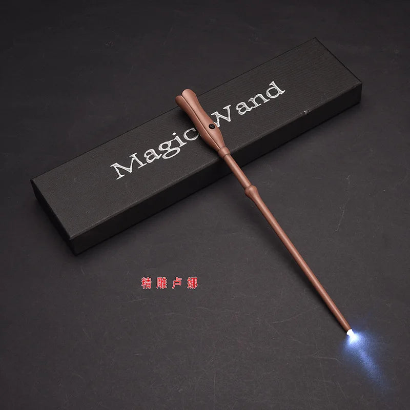 A brown LED light-up magic wand is displayed diagonally across a dark box with the text Magic Wand printed on it.