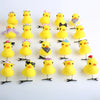 A collection of yellow 3D duck plush hair clips with various decorative elements arranged in a row.