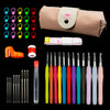 A complete crochet hook and knitting needle kit displayed with a storage bag, various colored tools, and a ruler.