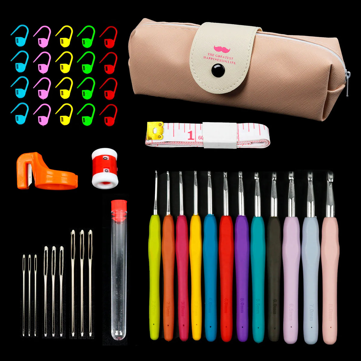 A complete crochet hook and knitting needle kit displayed with a storage bag, various colored tools, and a ruler.