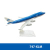 Diecast KLM Boeing airplane model in blue and white, viewed from the side.