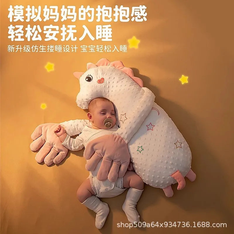 A baby is resting their head on a white unicorn plush pillow designed for soothing sleep.