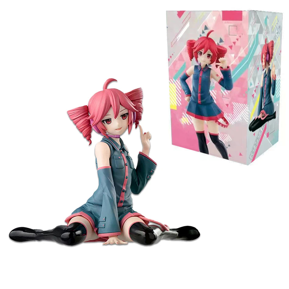 A pink Hatsune Miku PVC figure in a blue outfit is displayed next to its packaging box.