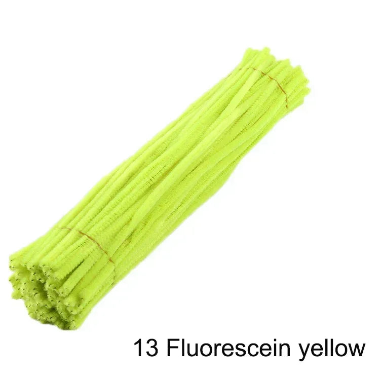 A bundle of fluorescent yellow chenille stems for crafting.