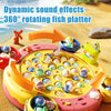 A colorful magnetic fishing platter with various fish figures is shown on a sandy background.