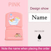 A pink waterproof labeling stamp featuring a bathtub design for custom kids names.