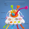 A colorful sensory pull string toy featuring various textures and balls for baby's first gift.