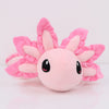 A pink kawaii axolotl plush toy with large pink petal-like ears and black eyes.