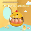 A yellow science incubator product featuring a transparent window holding several brown eggs and small chicks.