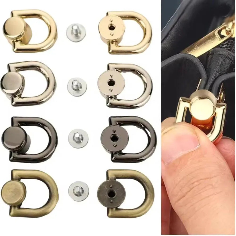A collection of D-shaped metal bag handles in various finishes and sizes, including gold, silver, and black.