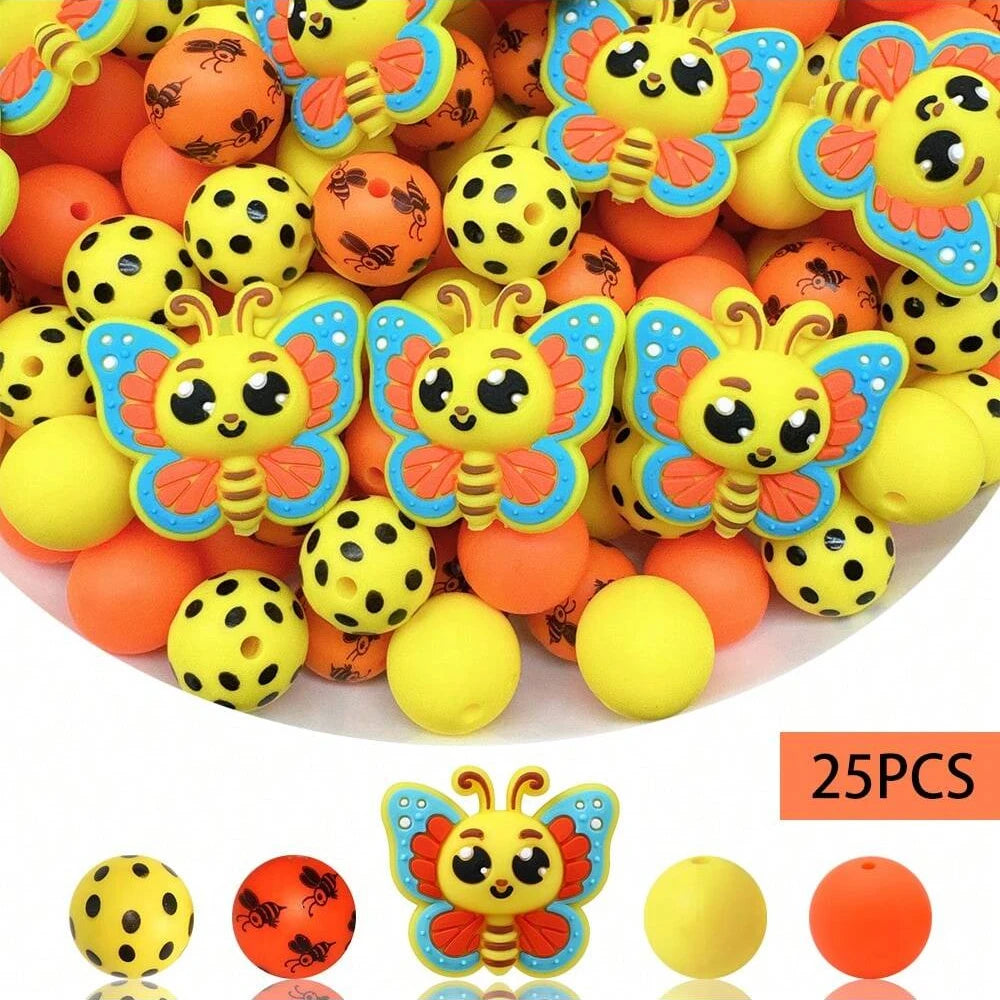 A pile of colorful 3D bee silicone beads in yellow, orange, and black, used for DIY crafts.