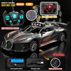 A black and orange remote control racing car with wheels, battery, and charging cable.