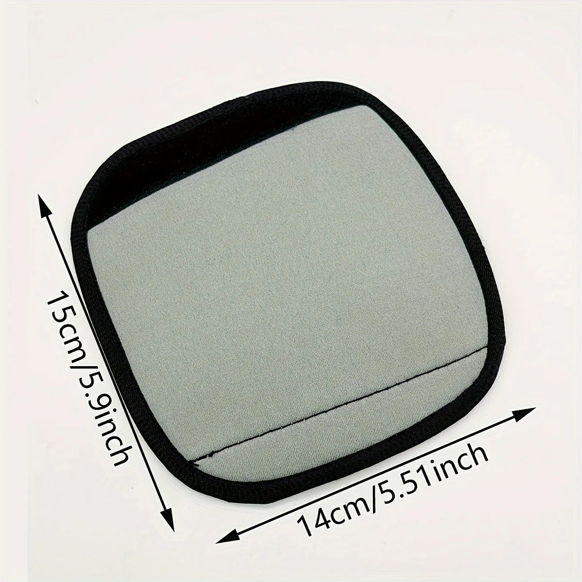 A black neoprene luggage handle cover with a gray cushioned grip shown flat.