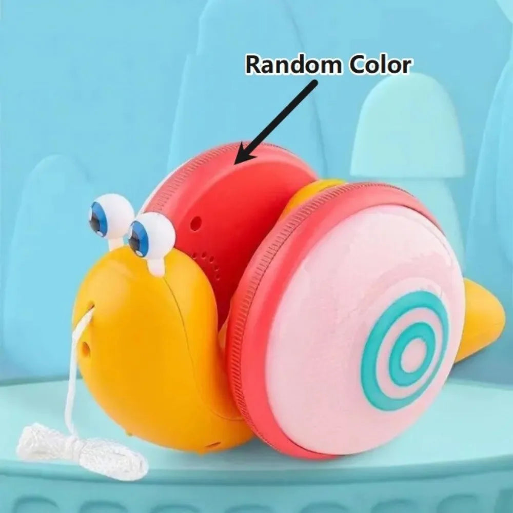 A colorful musical pull-along snail toy with a random color, featuring yellow and pink components.