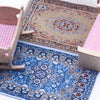 Handwoven Turkish style miniature carpet mat with intricate blue and beige patterns for dollhouse decor